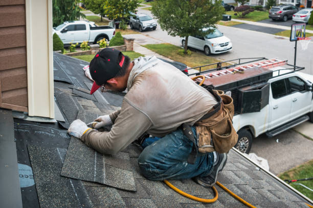 Professional Flat Roof Repair technician working in Farmersville, CA